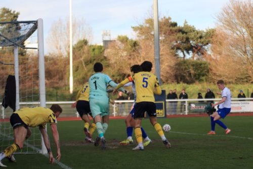 IMG 3749-Hayden-Bullas-sees-his-shot-blocked-by-no-3-Jay-Foulston