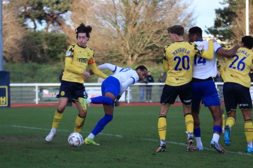 IMG 3790-Sam-Dreyer-L-and-Lamar-Reynolds-challenge-for-a-loose-ball