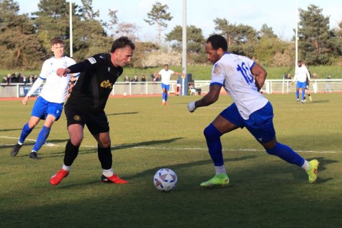 IMG 5445-Lamar-Reynolds-runs-at-Joel-Colbran