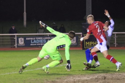 IMG 4876-Brennan-Camp-concedes-a-penalty-for-pulling-down-Lamar-Reynolds