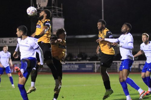 IMG 3282-Maidstones-Deon-Moore-heads-clear-from-Joe-Kizzi-leading-to-a-breakaway-from-which-Moore-scored-the-opening-goal