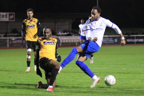 IMG 3342-David-Sesay-blocks-a-shot-from-Lamar-Reynolds-and-gets-caught-by-the-follow-through