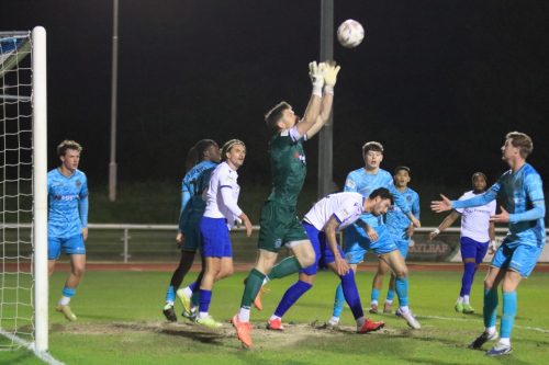 IMG 5015-Dovers-Mitch-Walker-collects-a-cross-ahead-of-Henry-Hawkins