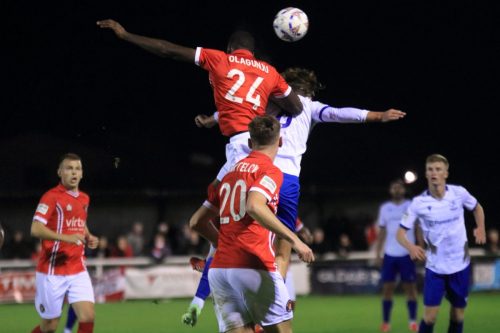 IMG 2121-Mustapha-Olagunju-wins-a-header-against-Sam-Youngs-making-his-351st-appearance-equalling-Rudi-Halls-club-record