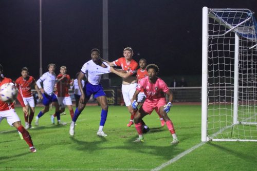 IMG 2221-Enfields-Bayley-Brown-and-Ebbsfleets-Ronny-Nelson-jockey-for-position-as-the-ball-comes-in-from-the-edge-of-the-frame