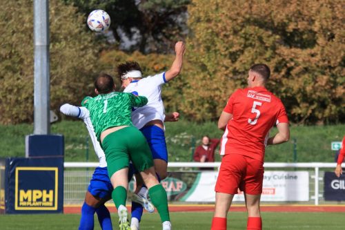 IMG 1825-Quorn-goalkeeper-Tom-Allsopp-is-beaten-to-the-ball-by-Sam-Youngs