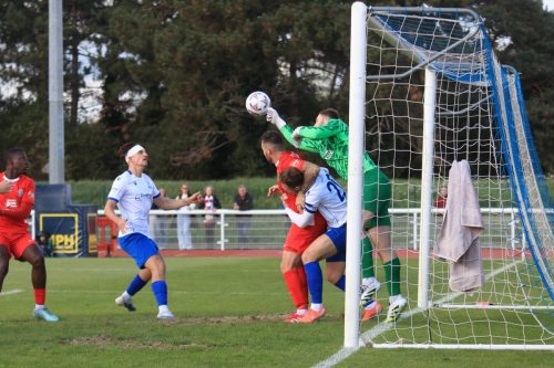 IMG 1959-Tom-Allsopp-punches-clear-under-pressure-from-Mickey-Parcell