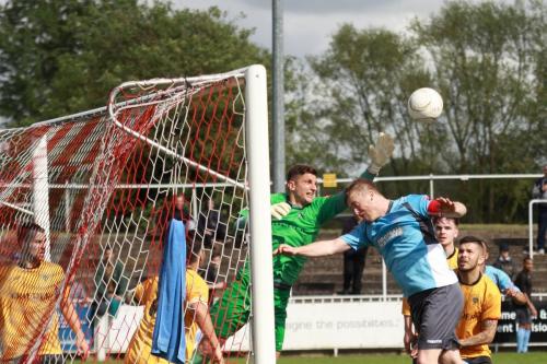 After-Ryan-Doyles-header-has-hit-the-crossbar-Cray-keeper-Darren-Behcet-just-beats-Mark-Kirby-to-the-ball
