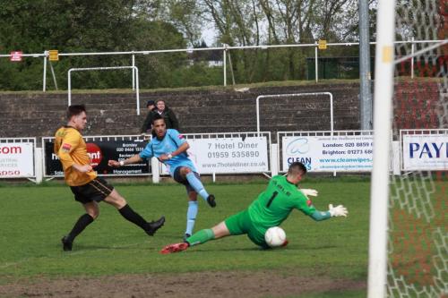 Cray-keeper-Darren-Behcet-appears-to-have-been-beaten-by-Corey-Whitely-but-he-has-taken-enough-pace-off-the-shot