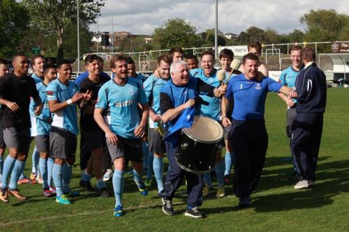 Enfield-manager-George-Borg-celebrates-on-the-drum