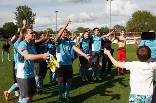 Enfield-players-celebrate-as-supporters-take-photos