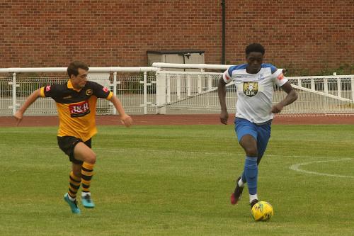 Jerry Gyebi brings the ball past Cheshunt's Joe Re