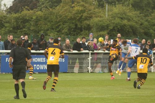 Enfield's Josh Urquhart heads a corner back across goal
