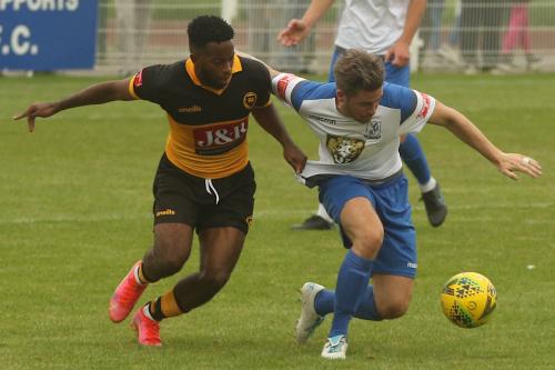 Lee-Chappell fends off Reece Beckles-Richards.