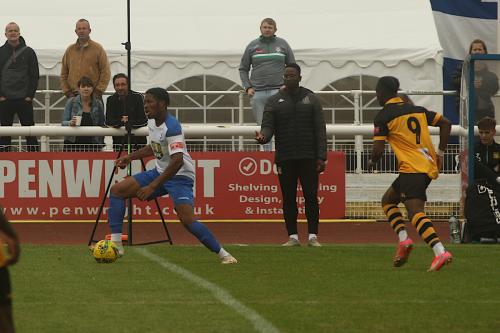 Enfield's Manny Maja and Cheshunt's Ken Charles