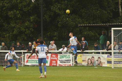 Enfield's Rian Bray nods away a header from Ken Charles