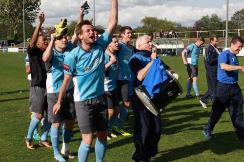 Jamie-Richards-and-George-Borg-lead-the-Enfield-celebrations