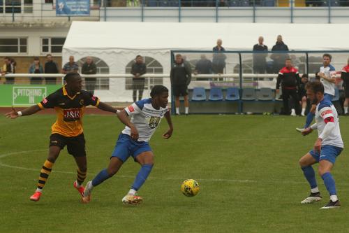 Manny Maja is pressured by Ken-Charles