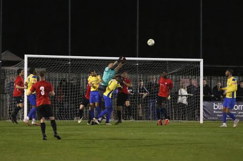 Nathan-McDonald-punches-a-corner-clear